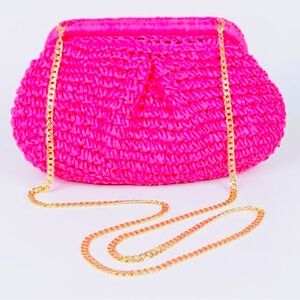 Faux Straw cross body Purse. Makes any outfit stand out.Can hold a lot of stuff